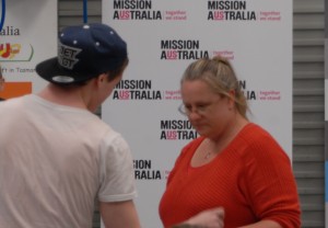 Participant hands over keys